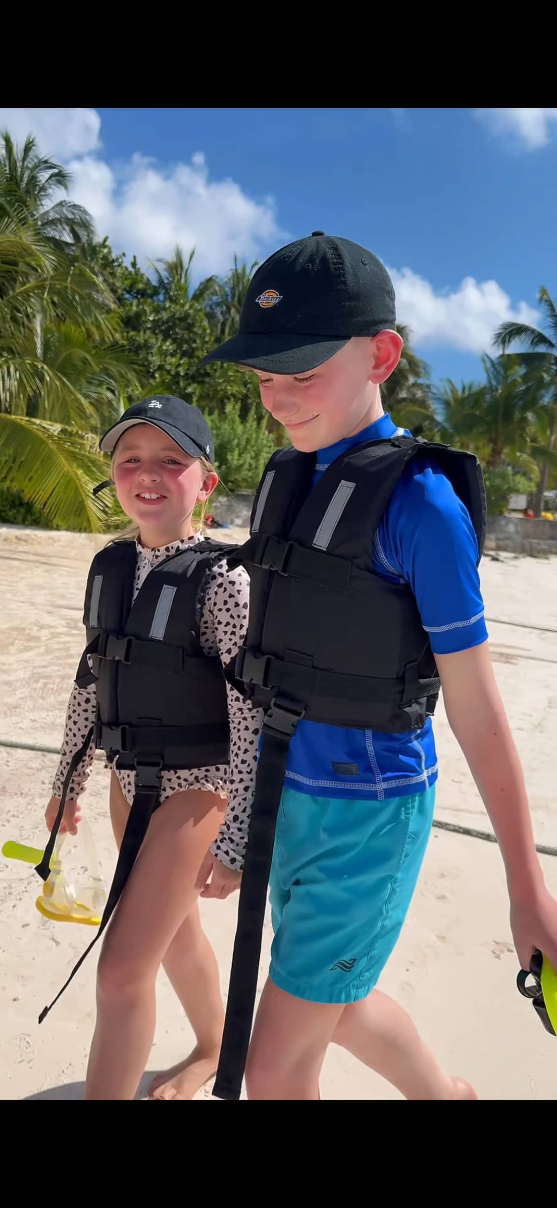 Two excited children with snorkel masks ready for turtle tour in Akumal
